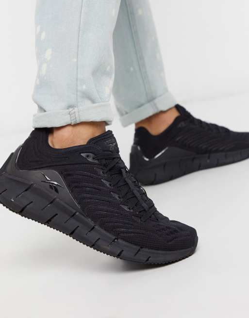 All black hot sale reebok zigs