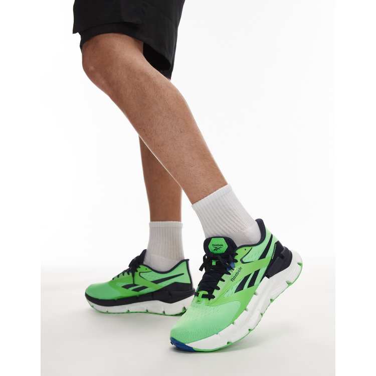 Reebok Zignition running trainers in green | ASOS