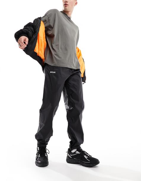Regatta Waterproof and breathable packaway trousers in Black - view 1