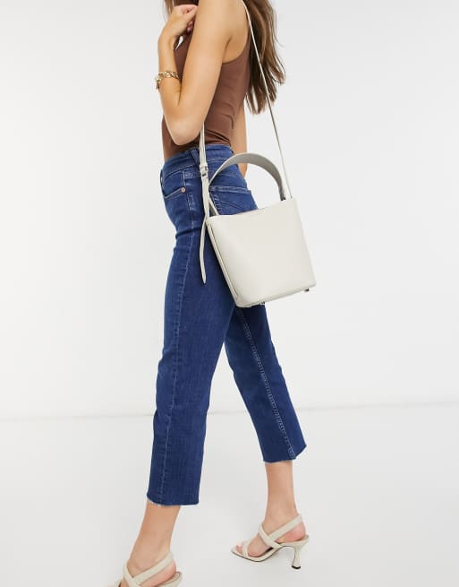 Reiss hudson leather mini bucket bag in off white