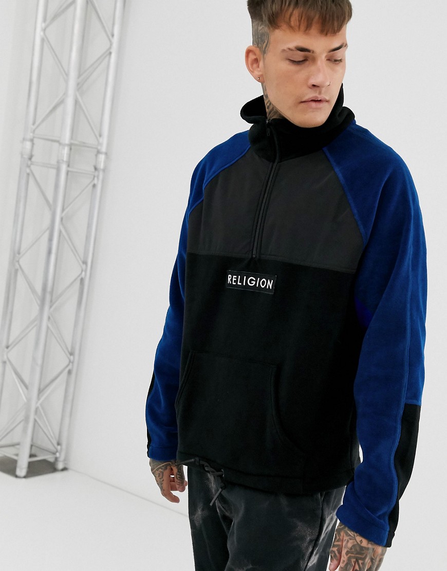 Religion - Blå/sort sweatshirt med fleecepaneler og kort lynlås