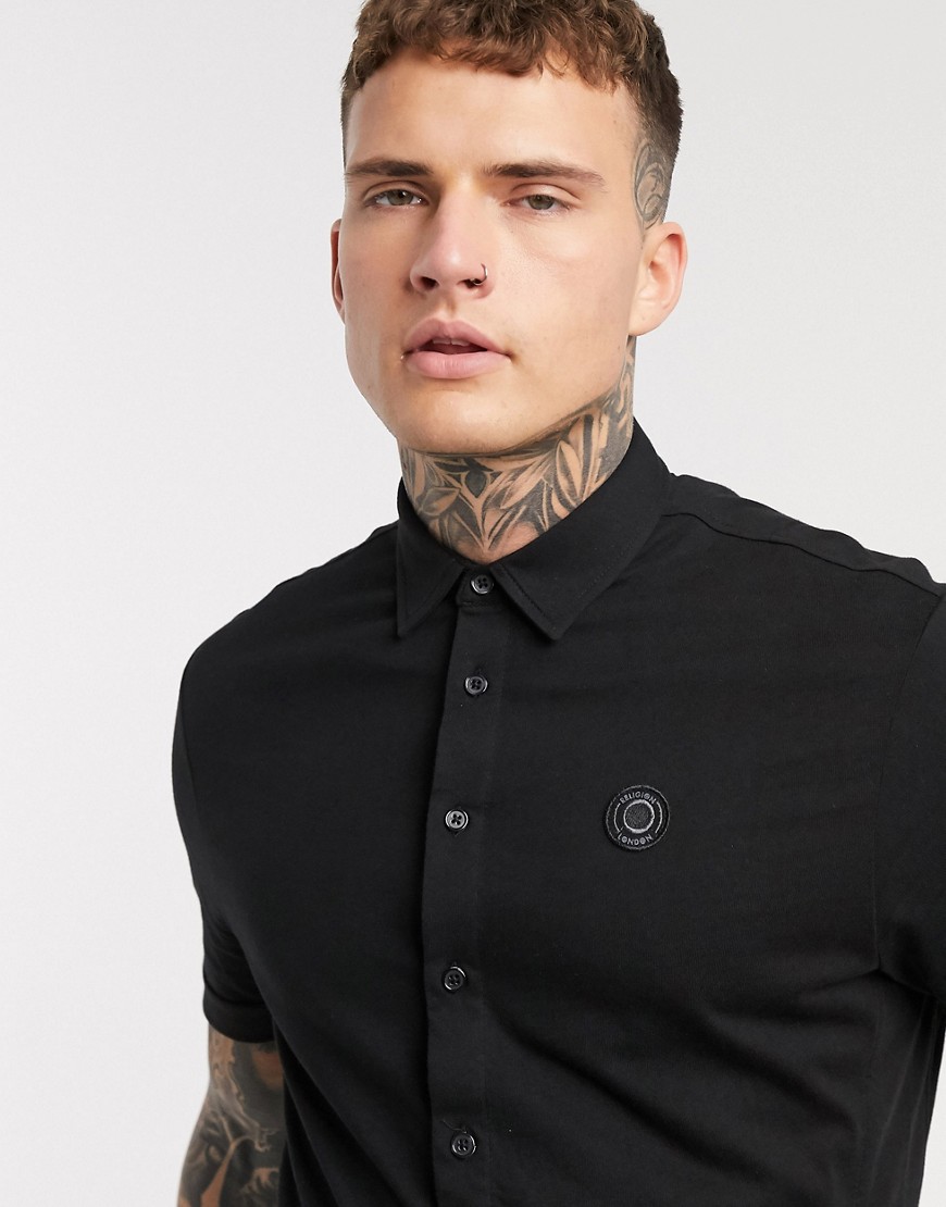 Religion - Jersey overhemd met korte mouwen en logo op de borst in zwart