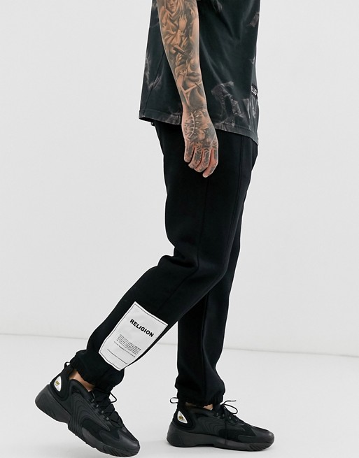 Religion joggers with patch detail in black