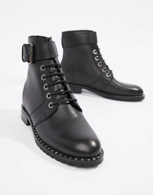 buckle flat ankle boots