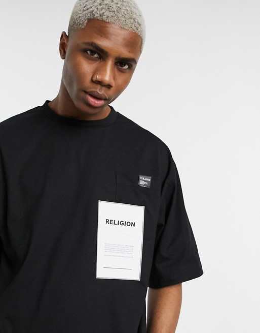 Religion oversized t-shirt with graphic pocket in black