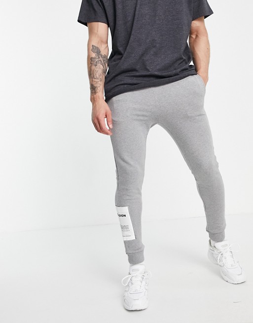 Religion plain patch joggers in light grey