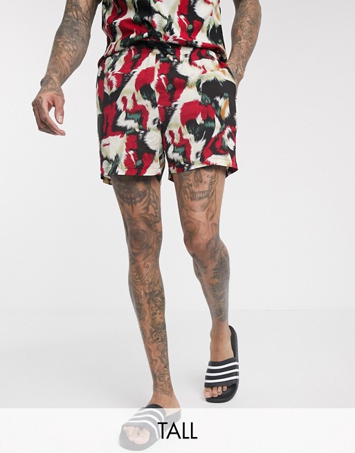 Religion Tall all over print swim shorts in red