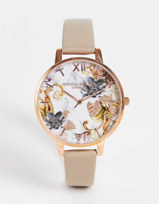 Reloj color arena y dorado rosa con diseño floral en la esfera de Olivia Burton