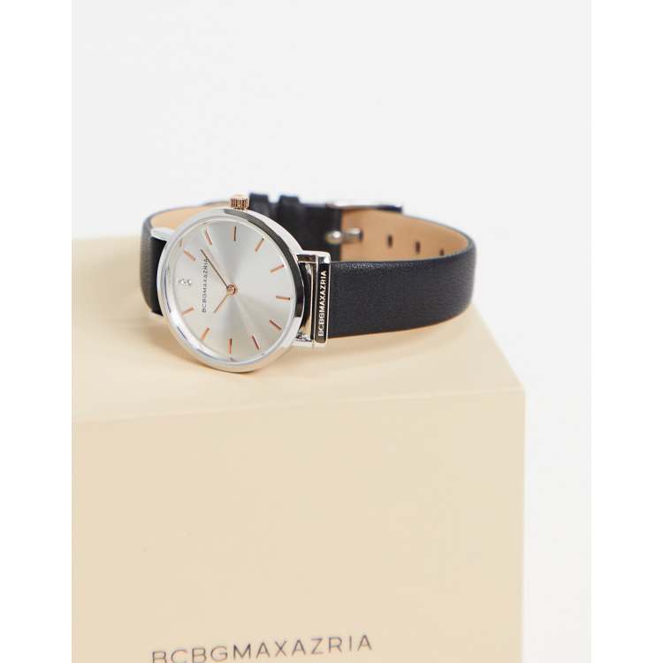 Reloj de pulsera con correa negra y esfera plateada de BCBG Max