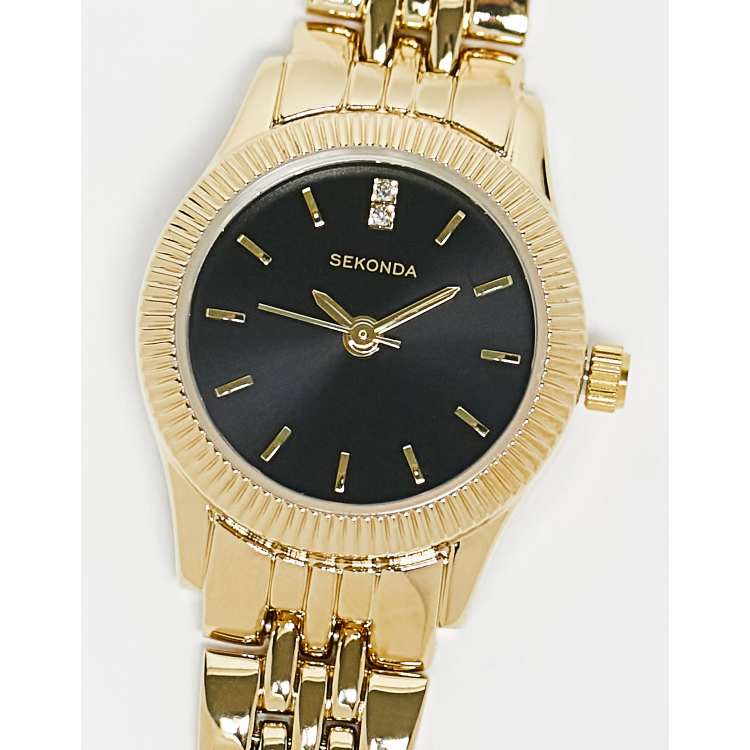 Reloj dorado esfera discount negra