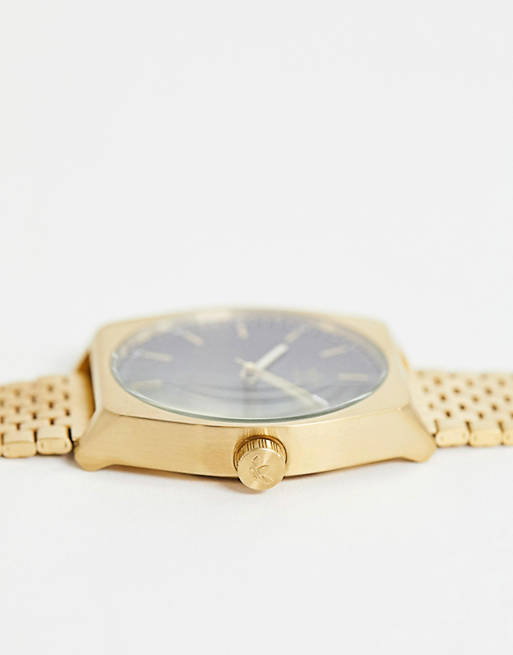 Reloj de pulsera en dorado con esfera azul marino Z02 Process adidas | ASOS