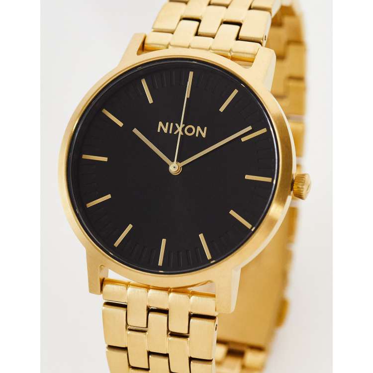 Precio reloj nixon dorado hot sale