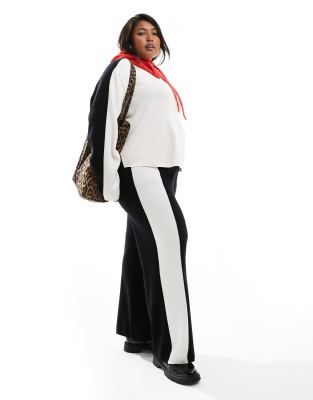 Renee Studio Plus x Holly Wynne - Exklusive Strickhose in Schwarz mit weitem Bein und seitlichem Kontraststreifen in Cre...