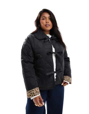 x Holly Wynne exclusive quilted frill collar tie front padded jacket in black with leopard print lining