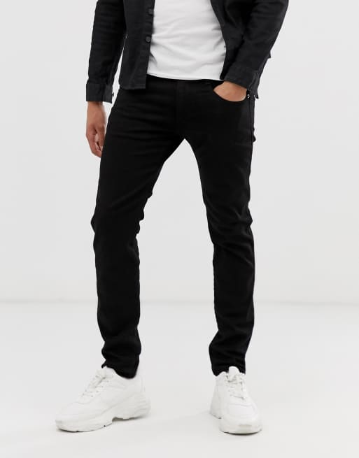 Replay – Anbass – Schmale Jeans mit Stretch-Anteil in Schwarz