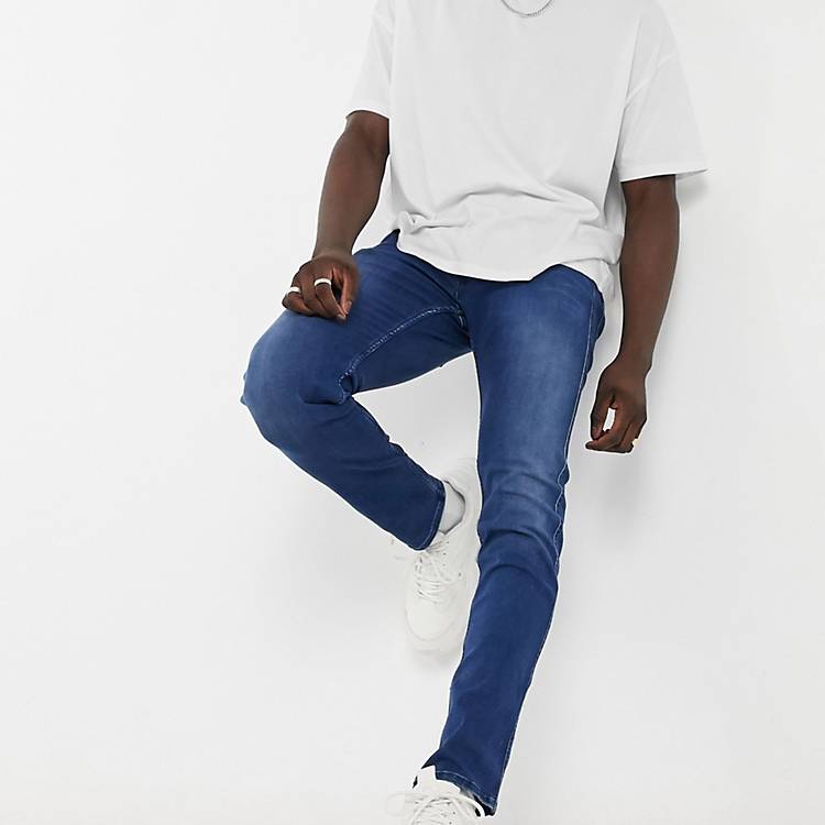 Replay Anbass slim fit jeans in medium blue | ASOS