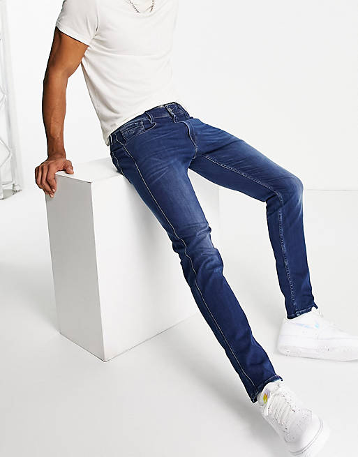 Replay Anbass slim fit jeans in mid blue | ASOS