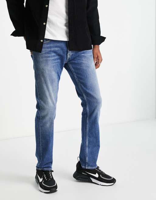 Replay – Rocco – Lässige Jeans in Mittelblau