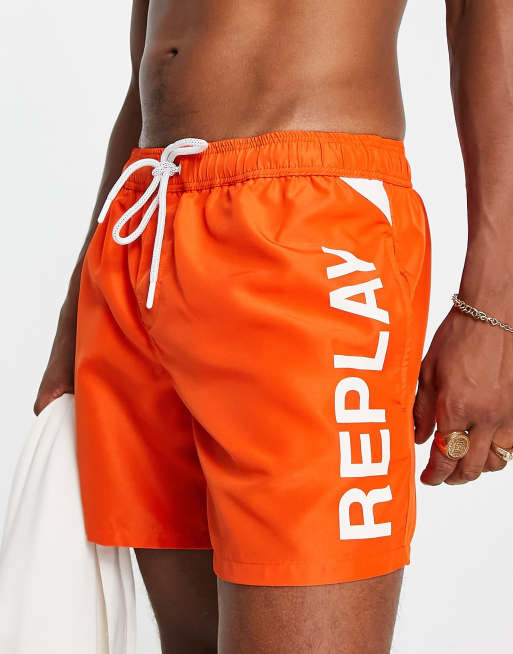 Derbevilletest Vernauwd Vijfde Replay swim shorts in orange | ASOS