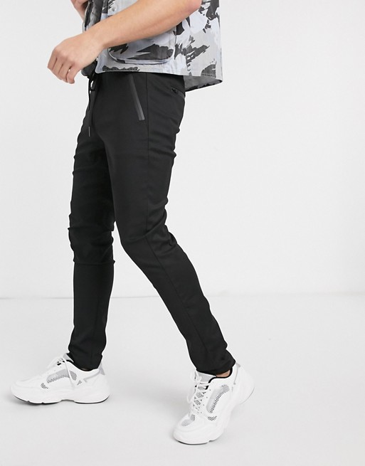 Replay tapered fit draw string trousers in black