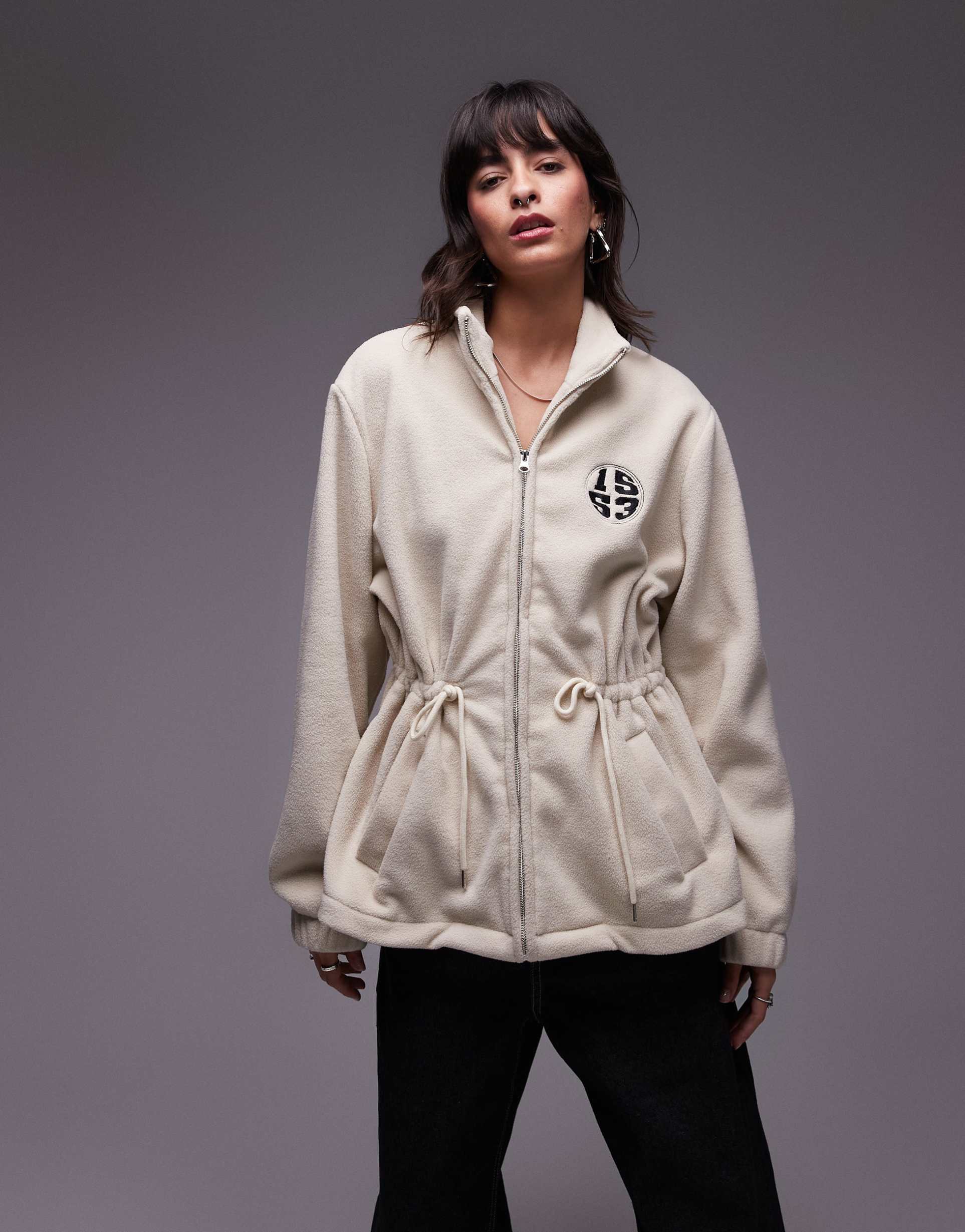 résumé zip up fleece with tie waist in cream