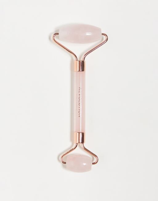 Revolution Beauty – Różowy kwarcowy roller do masażu twarzy