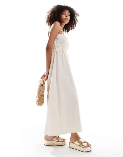 Rhythm – Classic – Beige smockad midiklänning 