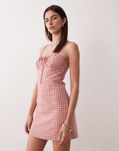 Rhythm gingham print gathered mini dress in pink - view 1