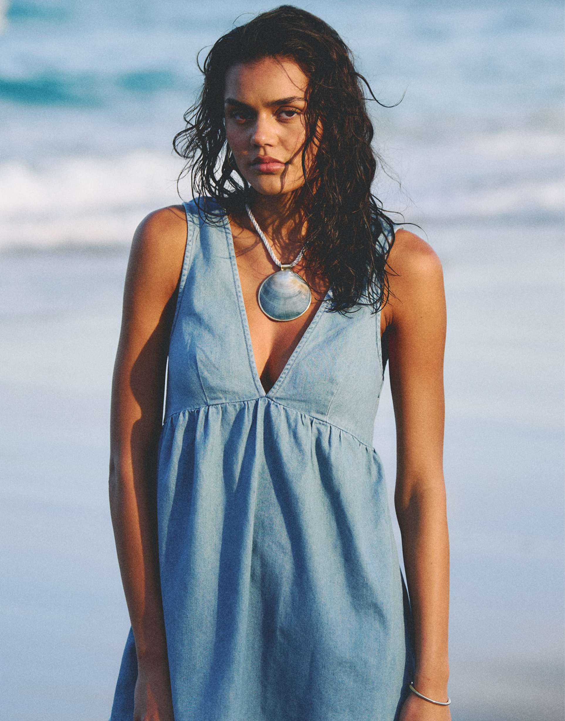 rhythm presley denim mini dress in lightwash blue