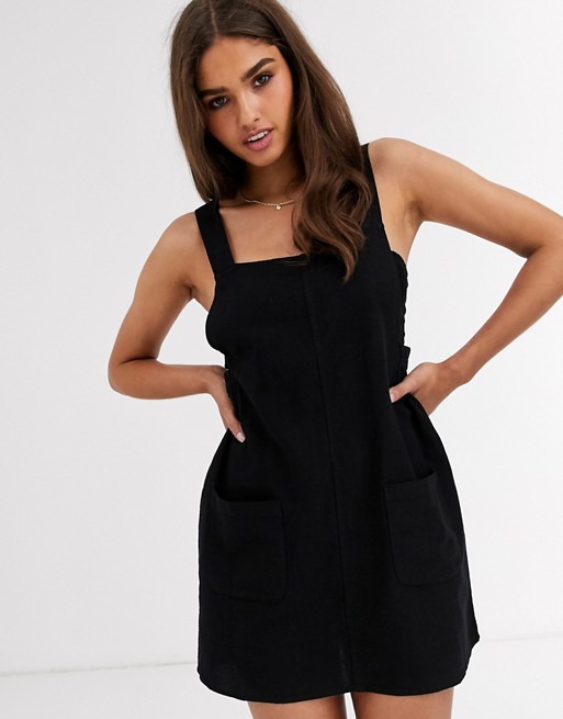 Rhythm Verona dress with front patch pocket in black