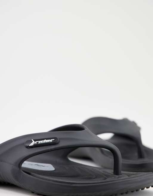 Rider cape thong sandals in black