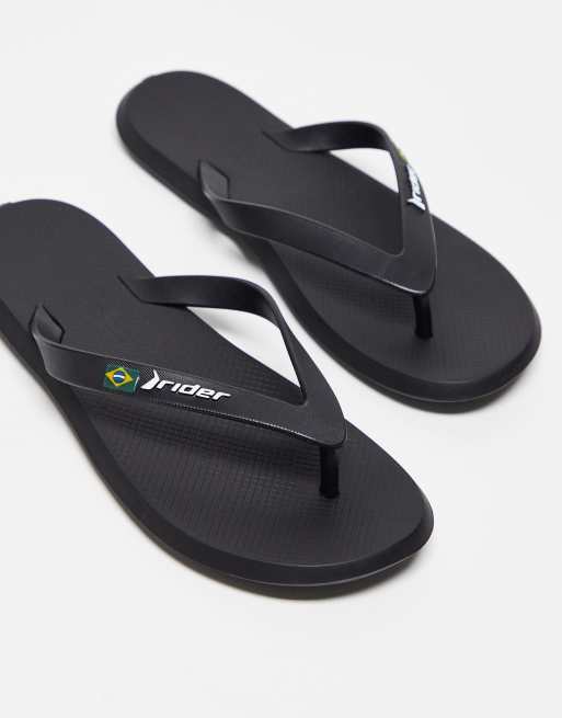 Rider – R1 21 – Zehenstegsandalen in Schwarz 