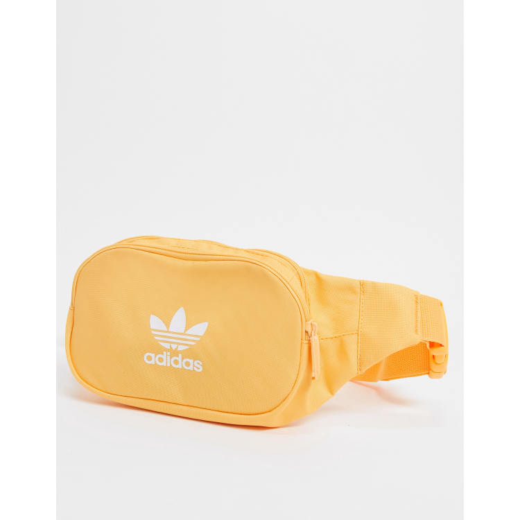 Especial Sindicato pianista Riñonera naranja de adidas Originals Essentials | ASOS