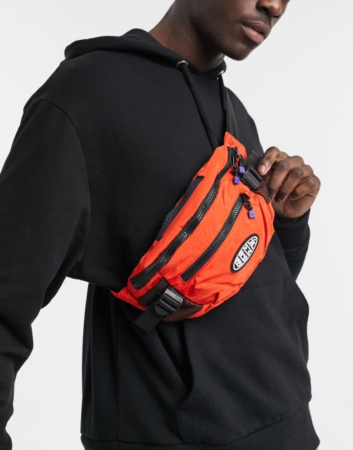 Riñonera oscura con logo de Grimey | ASOS