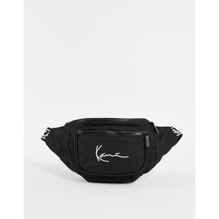 Riñonera negra con cinta de marca de Karl Kani | ASOS