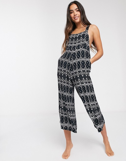 Rip Curl embroidered beach jumpsuit with wide leg in navy