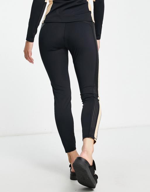 Rip Curl mirage ultimate uv surf leggings in black and beige