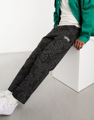 RIPNDIP wide leg casual trousers in black with all over cat print