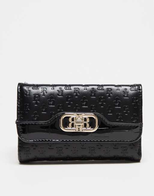 River Island 1451 Embossed Lock Foldover bag in Black | ASOS