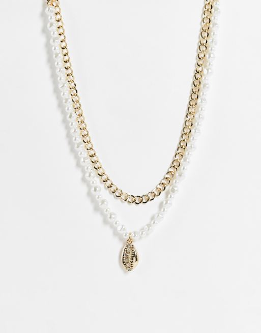 River Island – 2er-Set aus goldfarbenen Halsketten mit Kunstperlen und Muscheln