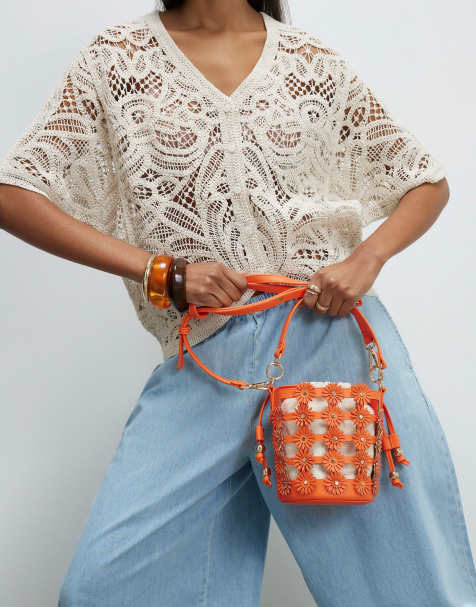 River Island 3d floral cut out bucket bag in orange - view 1