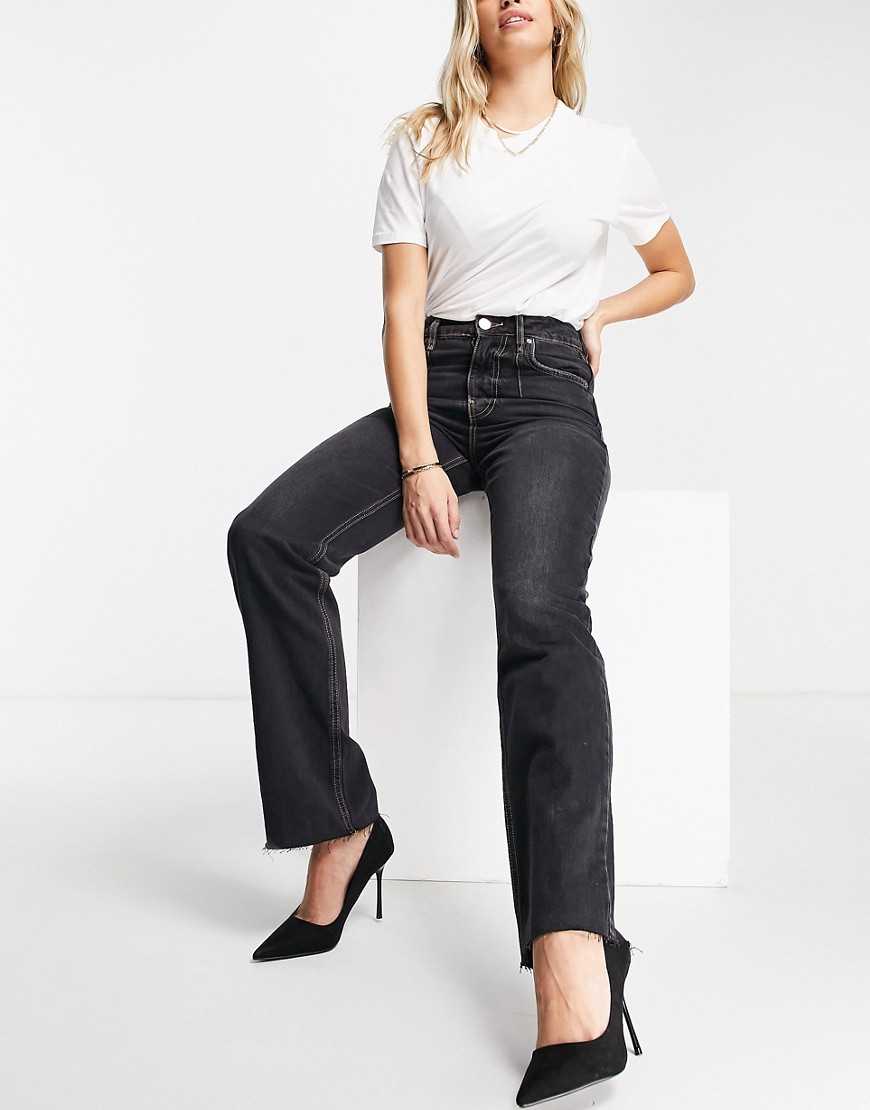 River Island 90’s high rise straight cut jeans with split hem in black