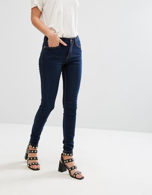 River Island Amelie mid rise skinny jeans in dark wash | ASOS