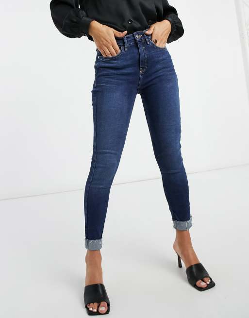 River Island Amelie skinny jeans in dark blue authentic wash | ASOS