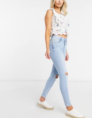 pale blue ripped skinny jeans