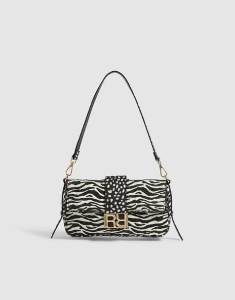 River Island Animal print faux hair on leather bag in black - view 1