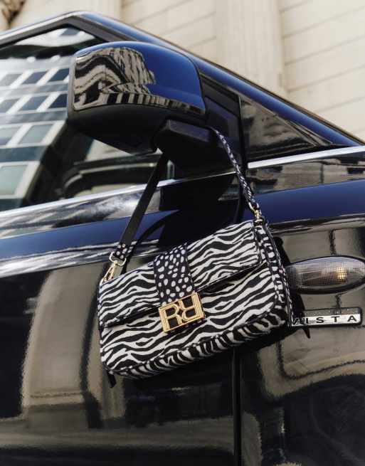 River Island Animal print faux hair on leather bag in black, 3 of 4