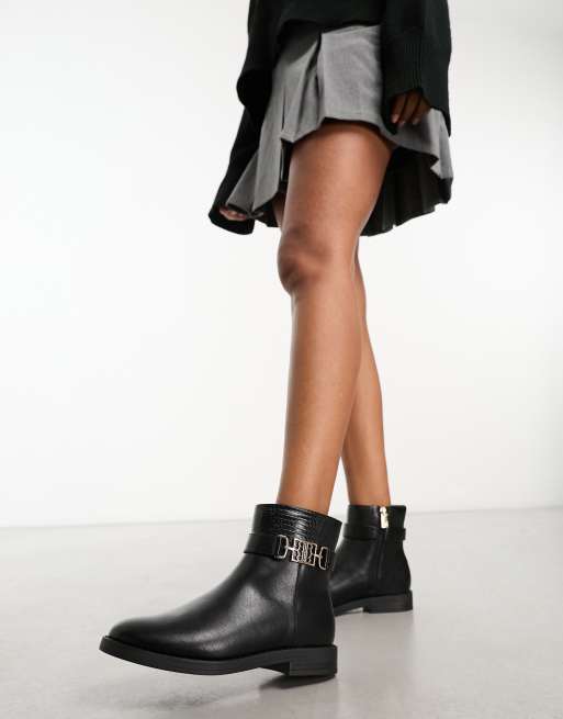 Ankle boots with 2025 gold buckles