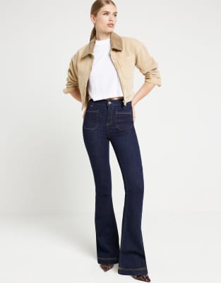 River Island - Ausgestellte Jeans in dunkelblauer Waschung