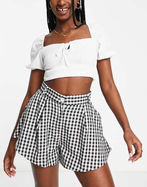 River Island – Ausgestellte, karierte Shorts in Schwarz, Kombiteil - view 1